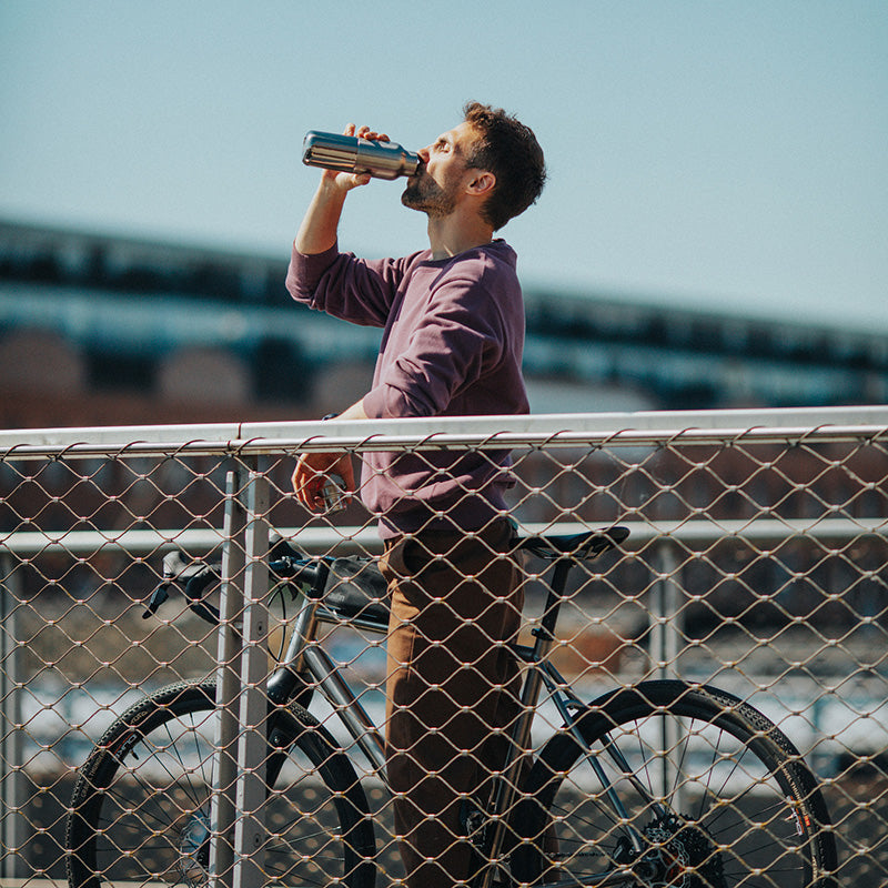 12oz-rise-reflect-with-bamboo-cap-l3 16oz_rise_reflect_man_bike_square.jpg