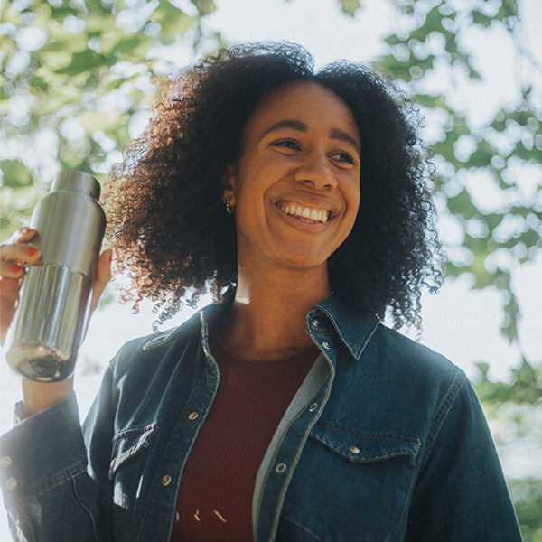 bring-your-own-party-kit-tumblers-and-cocktails-s7 16oz_rise_reflect_woman_smile_square.jpg