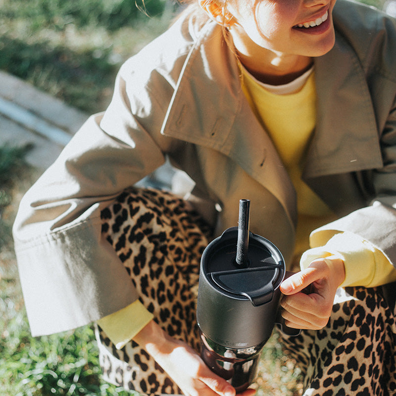 26oz-rise-tumbler-with-straw-lid-g5 26oz_rise_tumbler_black_woman_topview_square.jpg