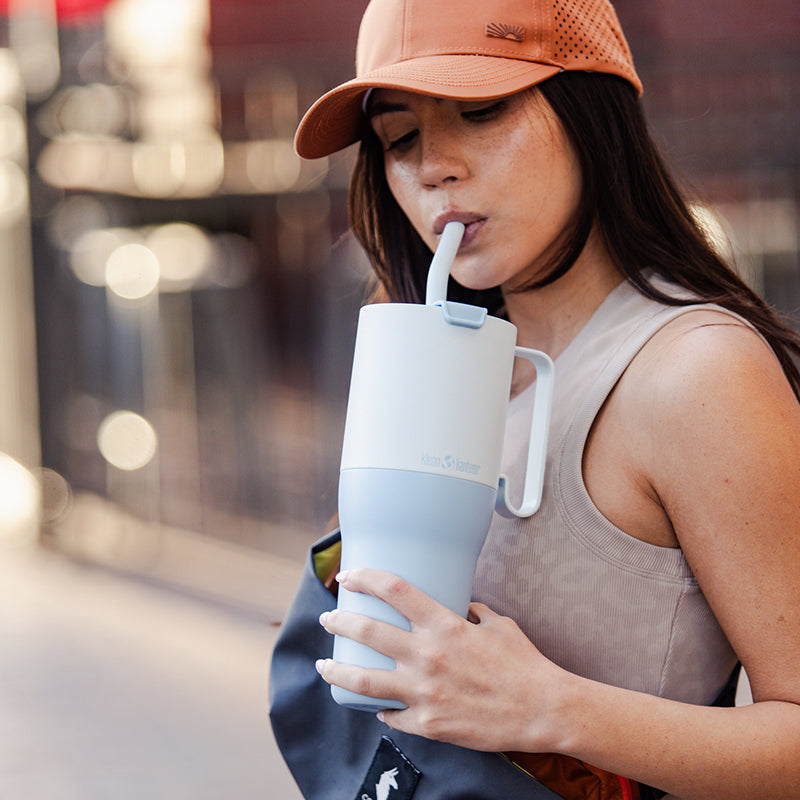 36oz-rise-tumbler-with-straw-lid-f3 36oz_rise_tumbler_straw_girl_sip_square.jpg