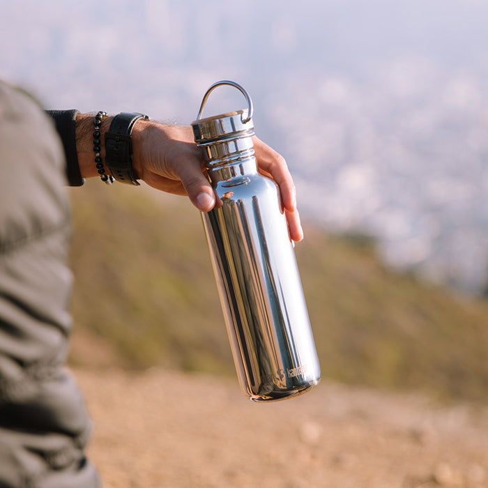 27oz-reflect-with-bamboo-cap-n1 K27SSLRF-MS-BAMBOO_reflect_bottle_hand_lifestyle.jpg
