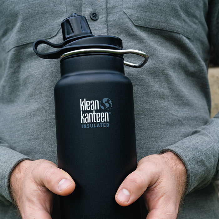 tkwide-chug-cap-i9 K32TKWSSL-SB-Craddled-Bottle_closeup_lifestyle.jpg