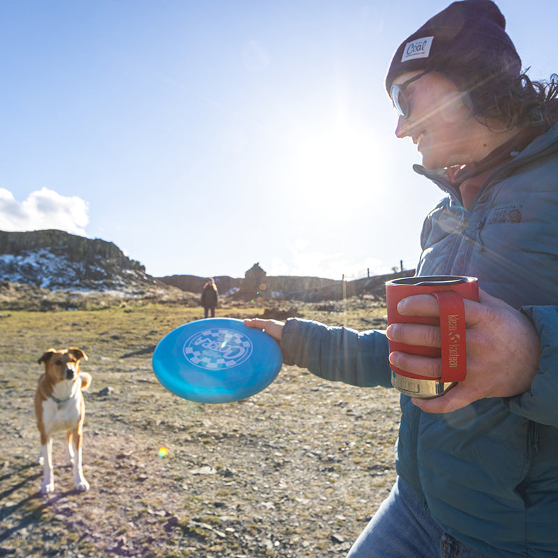 12oz-camp-mug-o3 insulated_camp_mug_12oz_woman_dog_frisbee_square.jpg